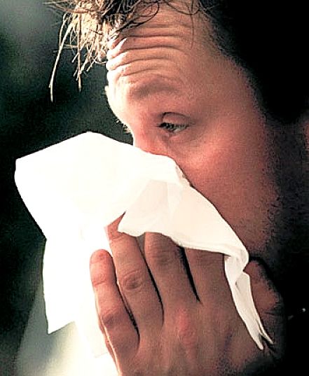 Sneezing and coffing as well as contactinated surfaces are likely sources of infection